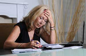stressed woman doing taxes